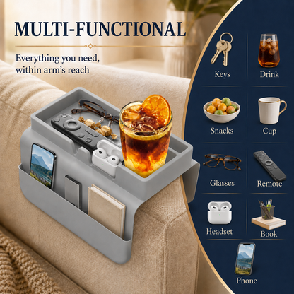 Grey silicone couch cup holder organizing keys, drinks, snacks, glasses, remote, earbuds, book and phone — multi-functional sofa armrest caddy keeping essentials within arm's reach.